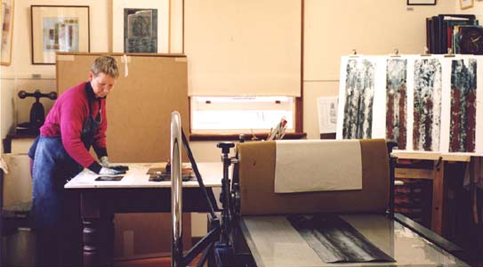 Jenny printing from corrugated iron in her studio