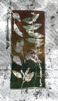 image of leaves in negative block with grey textured background. 